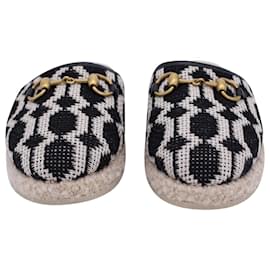 Gucci-Pantofole stampate Gucci Fria Shearling con dettaglio morsetto in tela nera-Altro