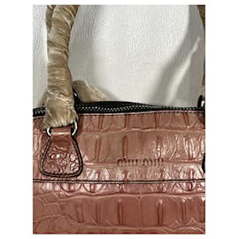 Miu Miu-Miu Miu Tasche aus Leder mit Krokodilprägung und Reißverschluss-Pink