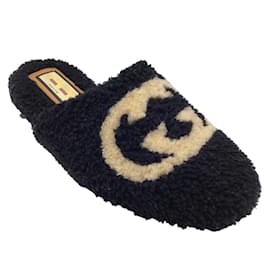 Autre Marque-Gucci Black / Pantuflas de piel de oveja con logo GG en beige-Negro
