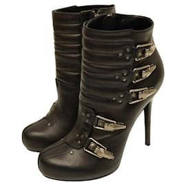Alexander Mcqueen-Alexander McQueen black leather buckled ski straps high heel calf ankle boots 40-Black