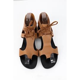 Hermès-Zapatos sandalias de cuero.-Castaño
