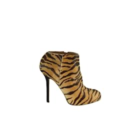 Sergio Rossi-Animal print boots - in their pony-style calf leather pouch-Beige