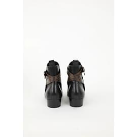 Louis Vuitton-Boots en cuir-Noir
