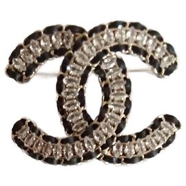 Broche cuir CHANEL Doré