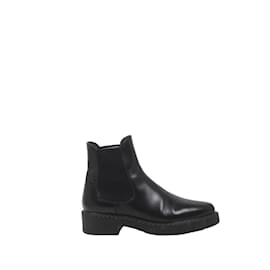 Prada-Leather moccasin boots-Black
