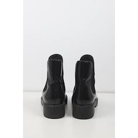 Prada-Leather moccasin boots-Black