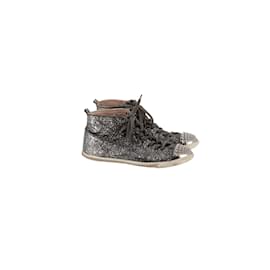 Miu Miu Studded Cap Toe Lace-Up Sneakers in Silver Glitter Silvery  ref.675530 - Joli Closet