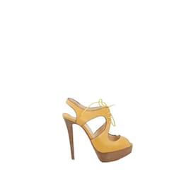 Christian Louboutin-Leather Heels-Yellow