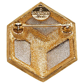Givenchy-Broche de metal dorado de Givenchy-Dorado