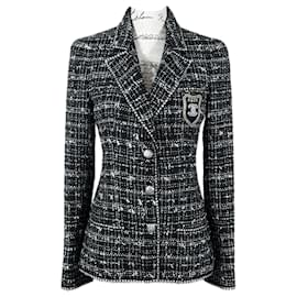 Chanel-Veste en tweed noire avec patch CC la plus recherchée, nouvelle collection-Noir