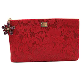 Dolce & Gabbana-Pochette zippée Dolce & Gabbana avec breloque en cristal Swarovski en dentelle rouge-Rouge