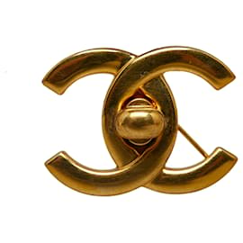 Chanel-Broche à verrouillage tournant CC dorée Chanel-Doré