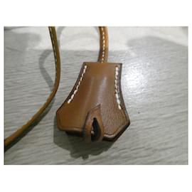 Hermès-clochette , cerniera per il nuovo lucchetto Hermès per la scatola del sacchetto per la polvere della borsa Hermès-Marrone
