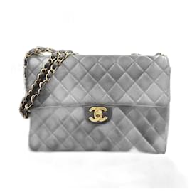 Chanel-Bolsa de couro acolchoada CC com aba 4-Preto