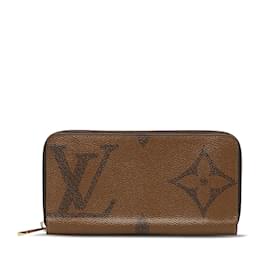 Louis Vuitton-Cartera larga con cremallera invertida gigante con monograma de Louis Vuitton Cartera larga de lona M69353 en buen estado-Castaño