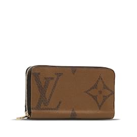 Louis Vuitton-Cartera larga con cremallera invertida gigante con monograma de Louis Vuitton Cartera larga de lona M69353 en buen estado-Castaño