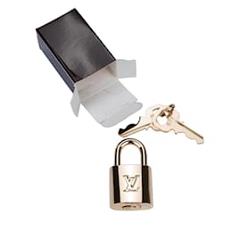 Louis Vuitton-Louis Vuitton Lock (novo com caixa)-Dourado