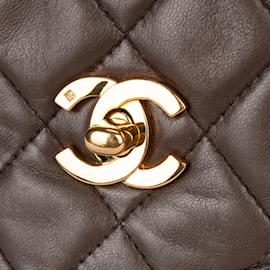 Chanel-Cuir d'agneau matelassé Chanel 24Sac à rabat à bandoulière pour appareil photo K Gold-Marron