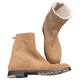 Botas de cano curto Chanel em couro camelo Camelo