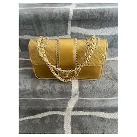 Chanel-Handbags-Mustard
