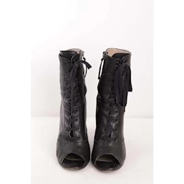 Miu Miu-Bottes à lacets en cuir-Noir