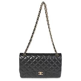 Chanel-Bolsa Chanel Black acolchoada em pele de cordeiro Jumbo Classic forrada com aba-Preto