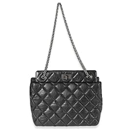 Chanel-Chanel schwarz gesteppte gealterte Einkaufstasche aus Kalbsleder neu aufgelegt-Schwarz