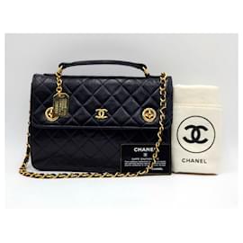 Chanel-Rara Chanel Vintage Timeless Classic CC forrada com trava giratória bolsa de ombro preta-Preto