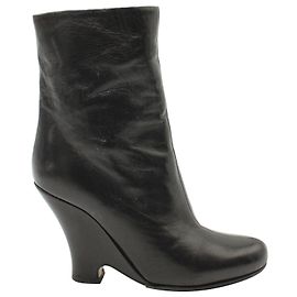 Botines de cuña Miu Miu en piel negra Negro