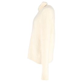 Saint Laurent Fuzzy Rollkragenpullover aus cremefarbener Wolle Weiß Roh