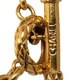 Chanel-Collar con colgante de medallón de sol Chanel CC de oro-Dorado