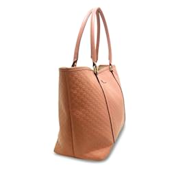 Gucci-Rosafarbene mittelgroße Microguccissima Joy-Einkaufstasche von Gucci-Pink