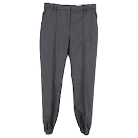 Alexander Mcqueen-Alexander McQueen Pantalón con puños elásticos en algodón gris-Gris