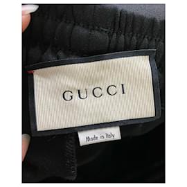 Gucci-Pantalones de chándal con cordón en la cintura y rayas tribandas de Gucci en algodón negro-Negro