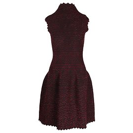 Alaïa Robe ajustée et évasée à pois Alaia en viscose bordeaux Bordeaux
