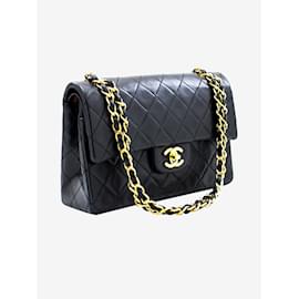 Chanel-Schwarze Farbe 1986 Kleine klassische gefütterte Überschlagtasche-Schwarz