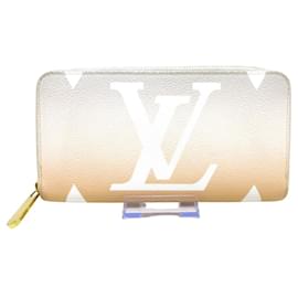 Louis Vuitton-Portefeuille zippy Louis Vuitton-Beige