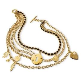 Dolce & Gabbana-Icônica pulseira vintage DOLCE &GABBANA "Multiple" em aço dourado-Dourado
