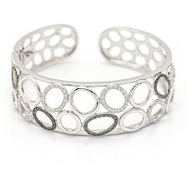 Autre Marque-Bracelet in Gold with Diamonds.-Silvery