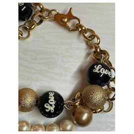 Dolce & Gabbana-Bracelet doublé DOLCE & GABBANA en chaîne dorée, Perles blanches, or et noir-Doré