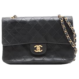 Chanel-Schwarze Farbe 1989 Mittelgroße klassische gefütterte Überschlagtasche-Schwarz