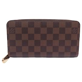 Louis Vuitton-NUOVO PORTAFOGLIO ZIPPY LOUIS VUITTON IN TELA DAMIER EBENE-Marrone