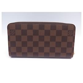 Louis Vuitton-NUOVO PORTAFOGLIO ZIPPY LOUIS VUITTON IN TELA DAMIER EBENE-Marrone