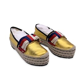 Gucci-Goldfarbene Sylvie Web Bow Espadrilles aus Leder, Plateauschuhe, Größe 41-Golden