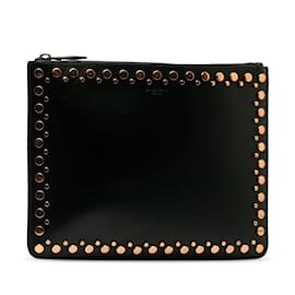 Givenchy-Bolso clutch de cuero con tachuelas de Givenchy negro-Negro