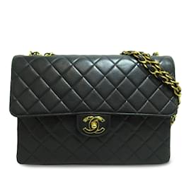 Chanel-Bolsa Chanel Jumbo Classic em pele de cordeiro preta com aba única-Preto