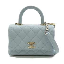 Chanel-Bolsa com aba com alça pequena acolchoada CC Caviar AS2215-Azul