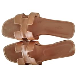 Hermès-Oran sandals in gold smooth calf leather-Brown