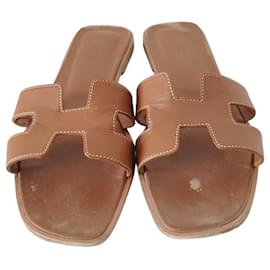 Hermès-Oran sandals in gold smooth calf leather-Brown