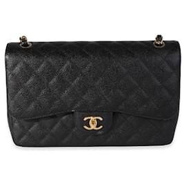 Chanel-Borsa con patta classica foderata in caviale trapuntato nero Chanel-Nero